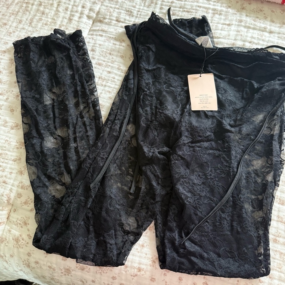 Lace flared cropped pants Never